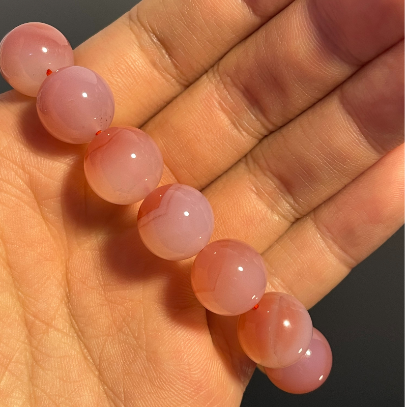 Peach Pink Crystal - Attracts wealth, calms the mind, love