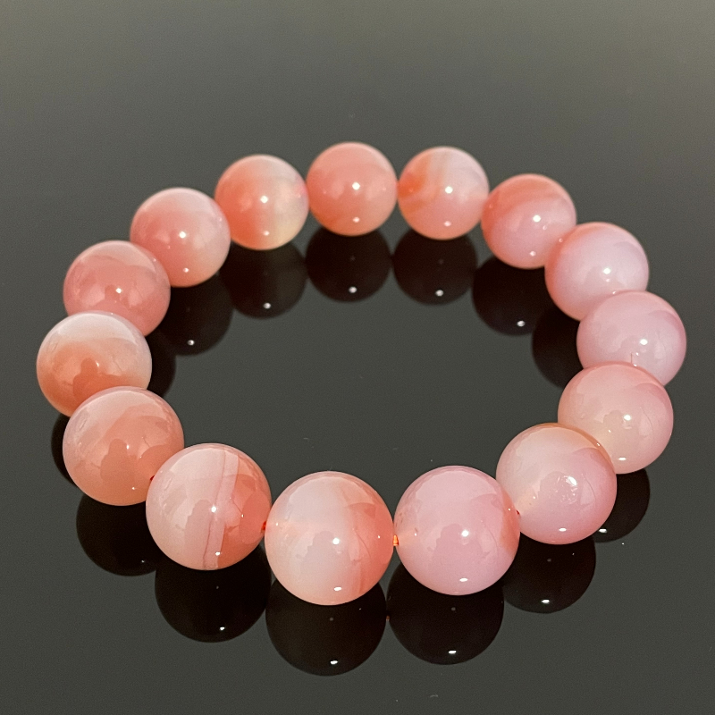 Peach Pink Crystal - Attracts wealth, calms the mind, love