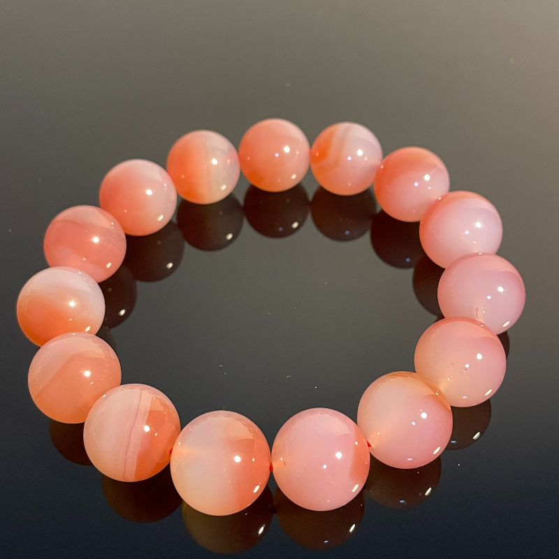 Peach Pink Crystal - Attracts wealth, calms the mind, love