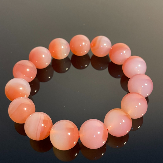 Peach Pink Crystal - Attracts wealth, calms the mind, love